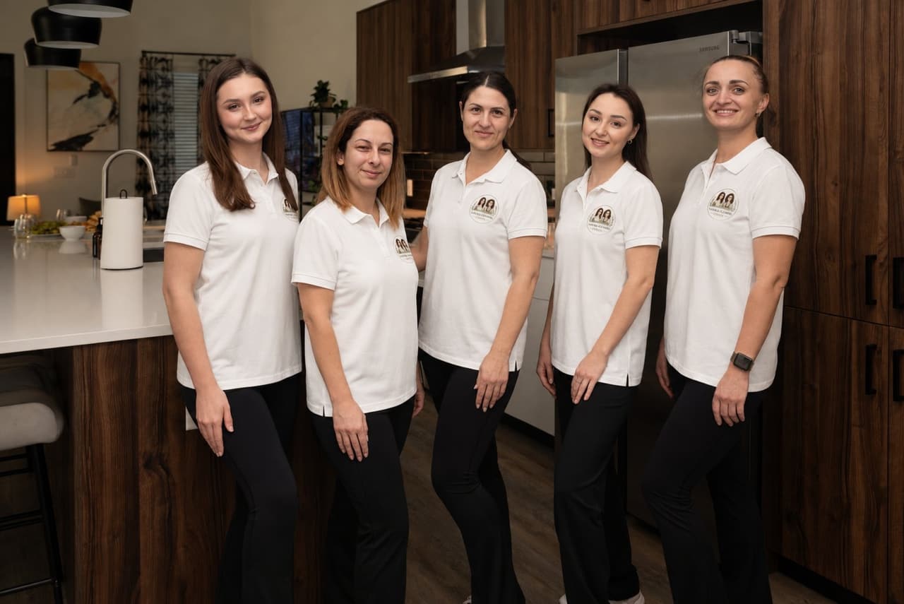 Natural Cleaning Experts team of trained cleaning specialists in branded uniforms