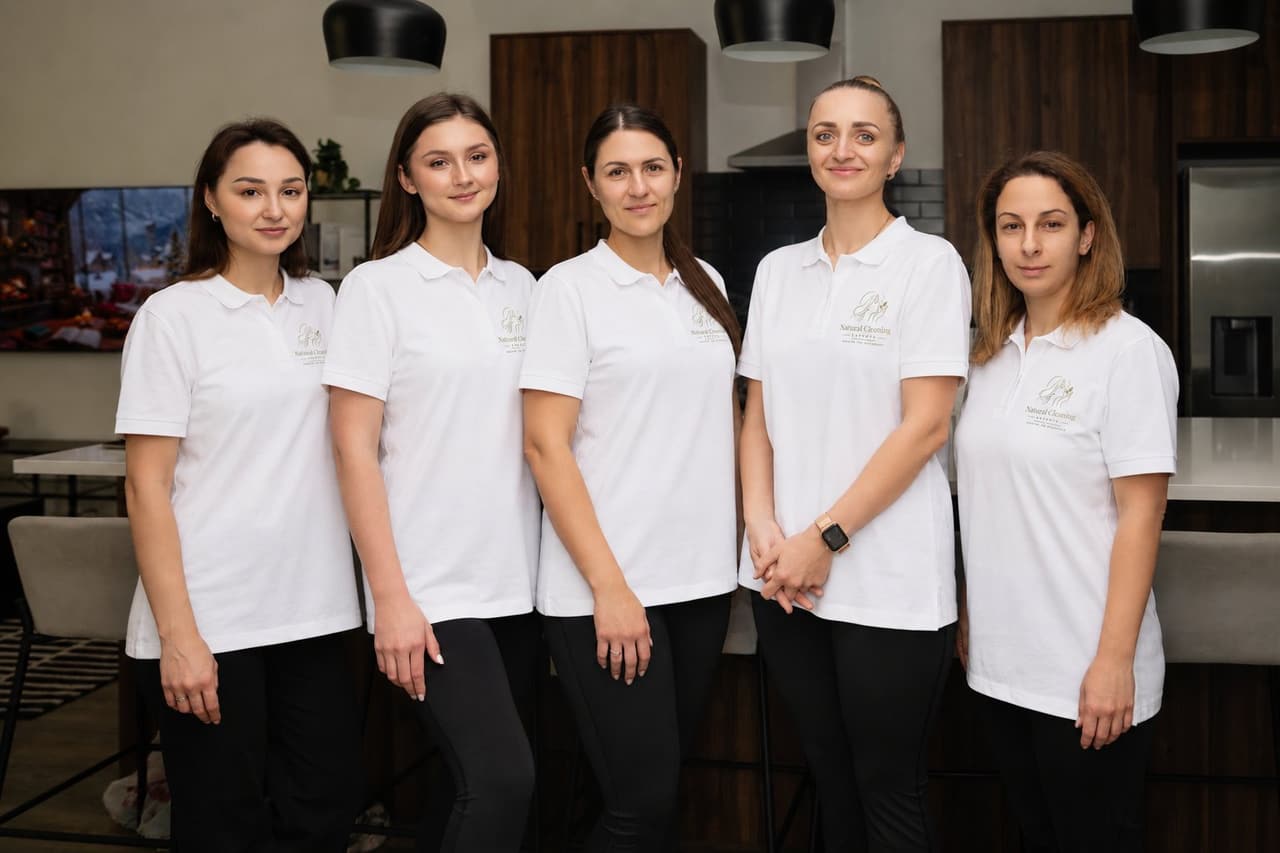 The Natural Cleaning Experts team — trained home care specialists in our uniform